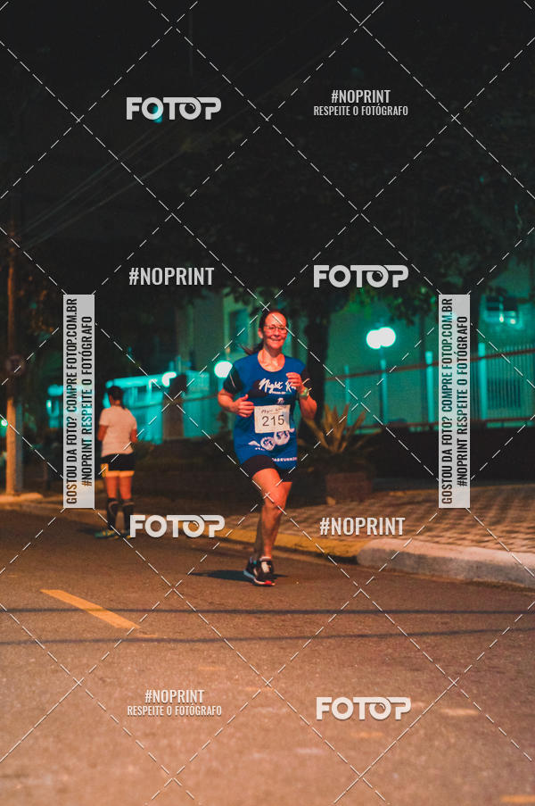 Buy your photos of the eventNight Run 5K 10K Praia Grande on Fotop