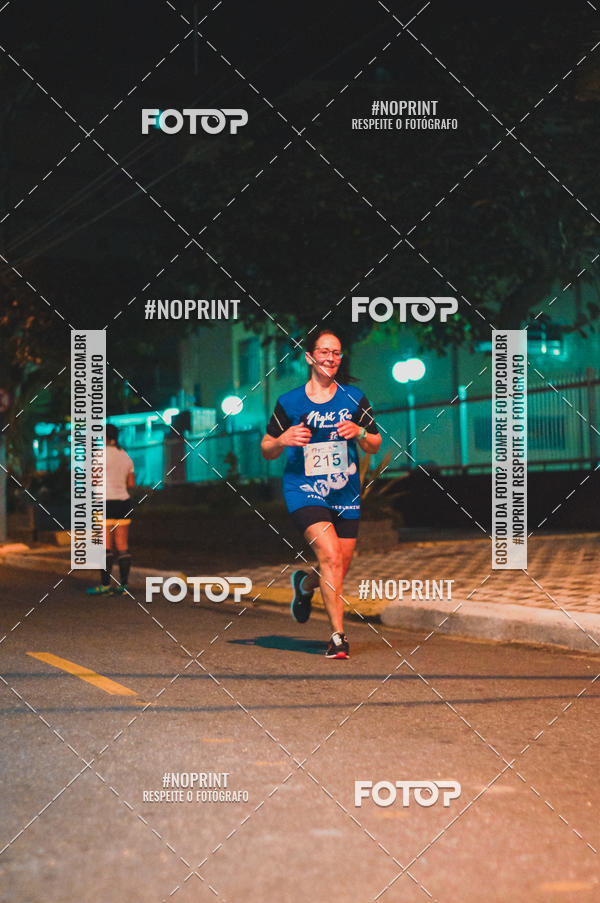 Buy your photos of the eventNight Run 5K 10K Praia Grande on Fotop