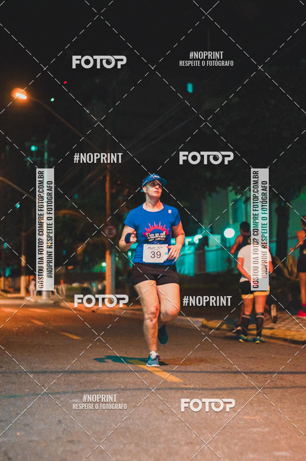 Buy your photos of the eventNight Run 5K 10K Praia Grande on Fotop