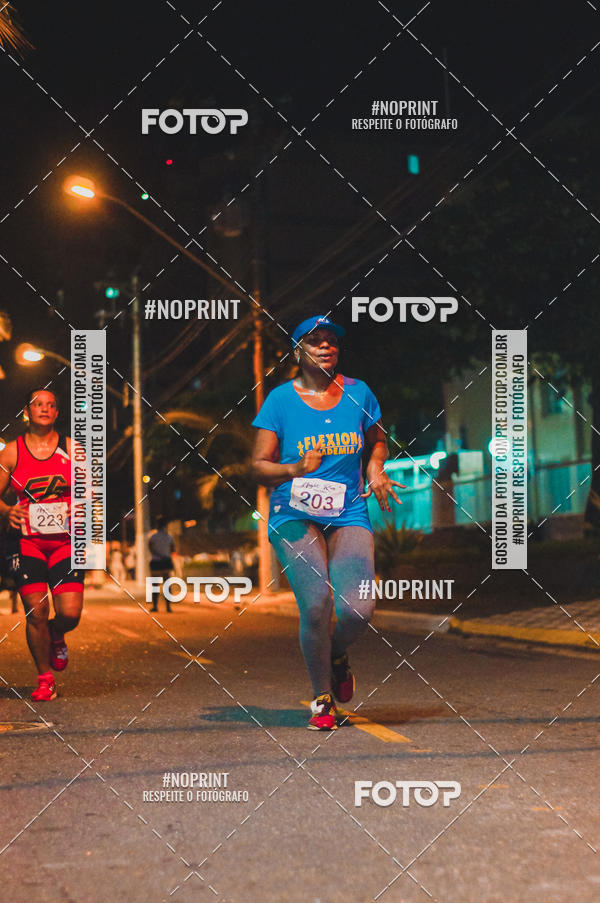 Buy your photos of the eventNight Run 5K 10K Praia Grande on Fotop