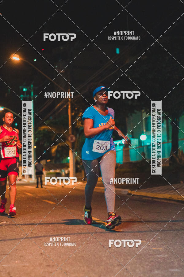 Buy your photos of the eventNight Run 5K 10K Praia Grande on Fotop