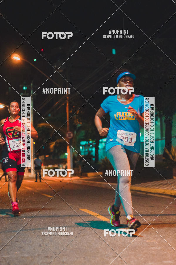 Buy your photos of the eventNight Run 5K 10K Praia Grande on Fotop