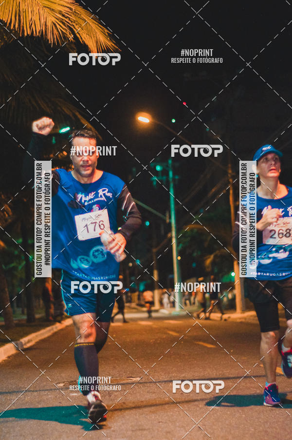 Buy your photos of the eventNight Run 5K 10K Praia Grande on Fotop