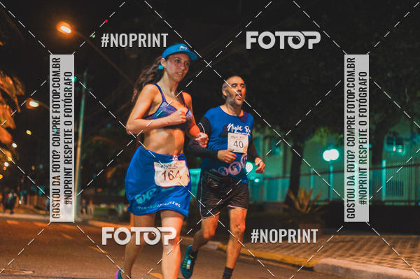 Buy your photos of the eventNight Run 5K 10K Praia Grande on Fotop