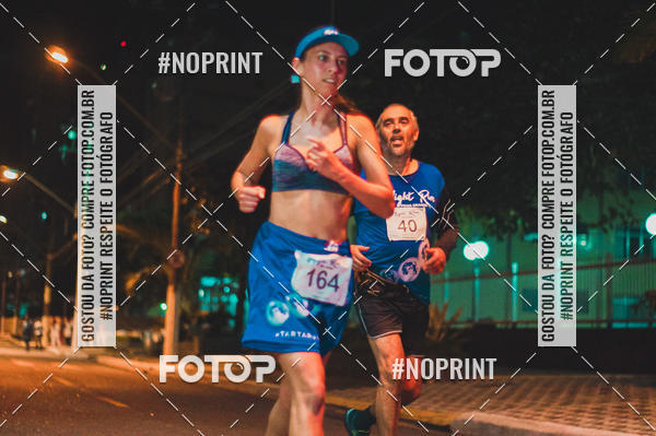 Buy your photos of the eventNight Run 5K 10K Praia Grande on Fotop