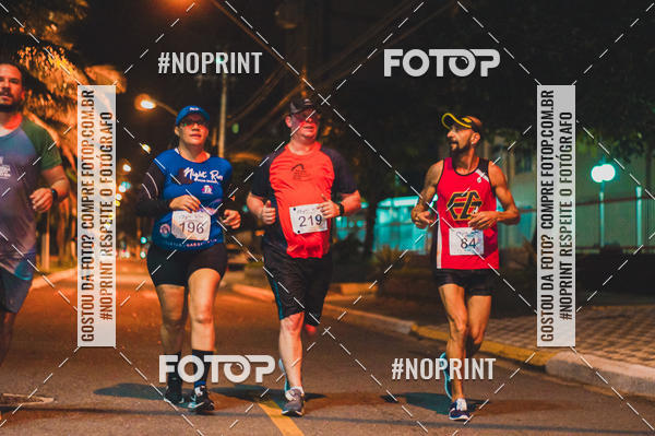 Buy your photos of the eventNight Run 5K 10K Praia Grande on Fotop