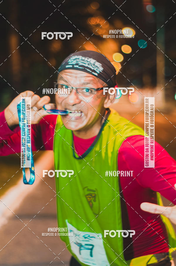 Buy your photos of the eventNight Run 5K 10K Praia Grande on Fotop