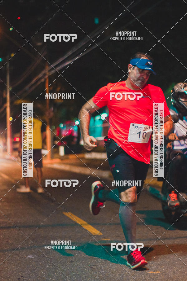 Buy your photos of the eventNight Run 5K 10K Praia Grande on Fotop
