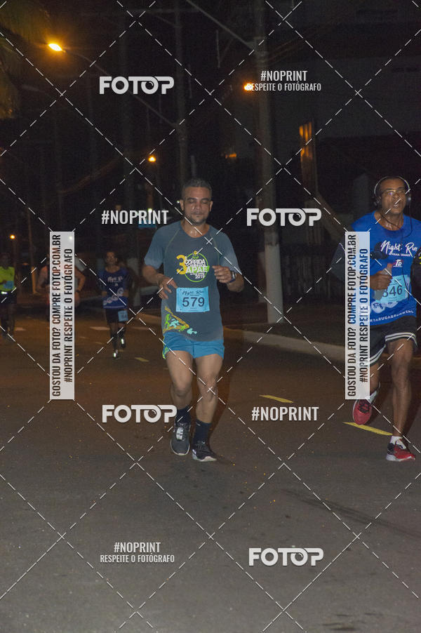 Buy your photos of the eventNight Run 5K 10K Praia Grande on Fotop