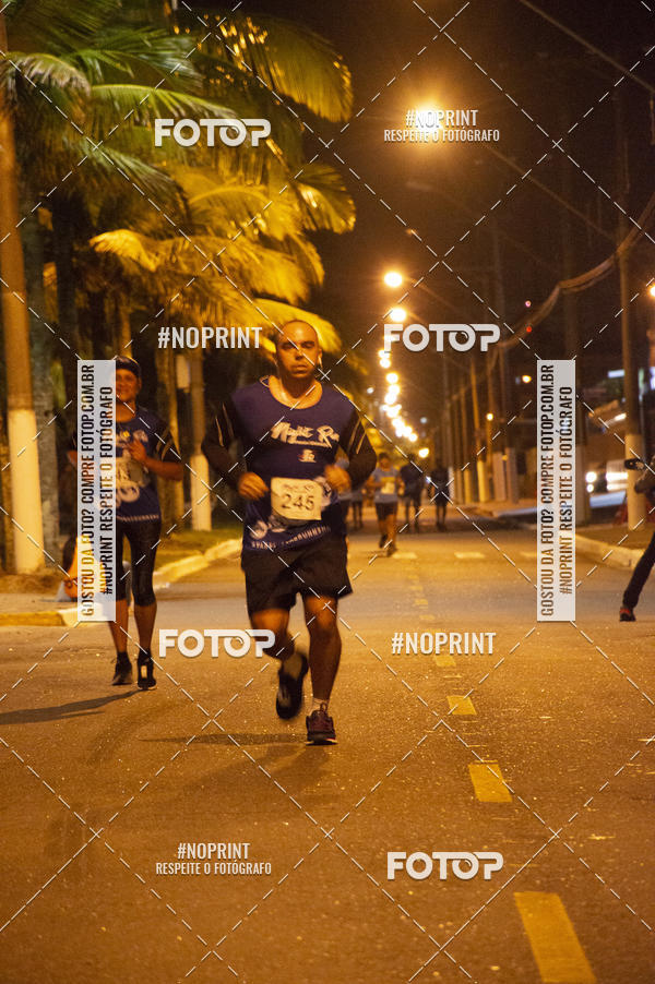 Buy your photos of the eventNight Run 5K 10K Praia Grande on Fotop