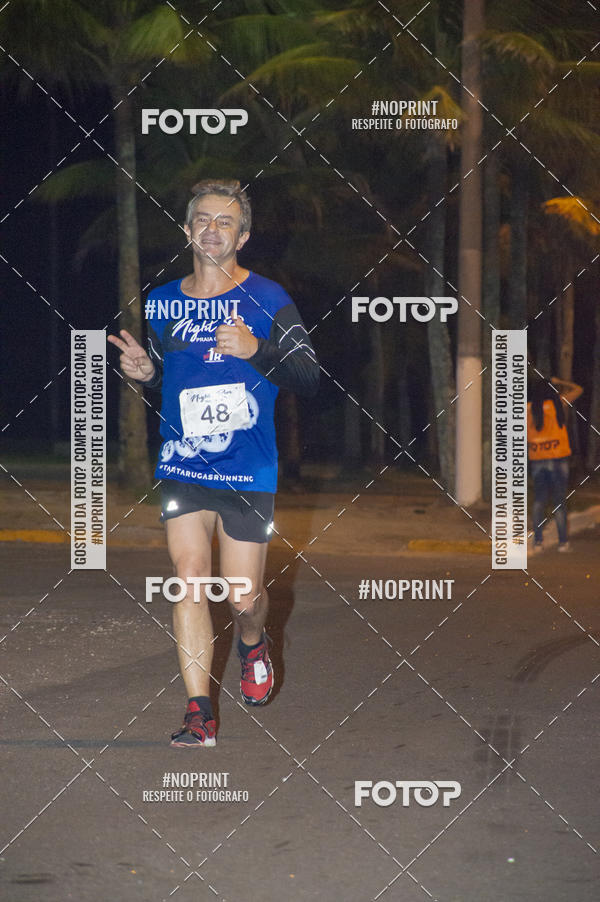Buy your photos of the eventNight Run 5K 10K Praia Grande on Fotop