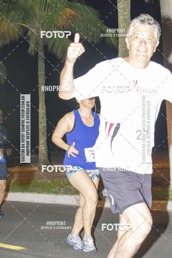 Buy your photos of the eventNight Run 5K 10K Praia Grande on Fotop