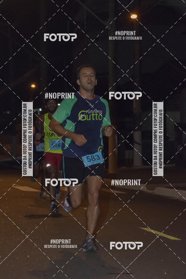 Buy your photos of the eventNight Run 5K 10K Praia Grande on Fotop