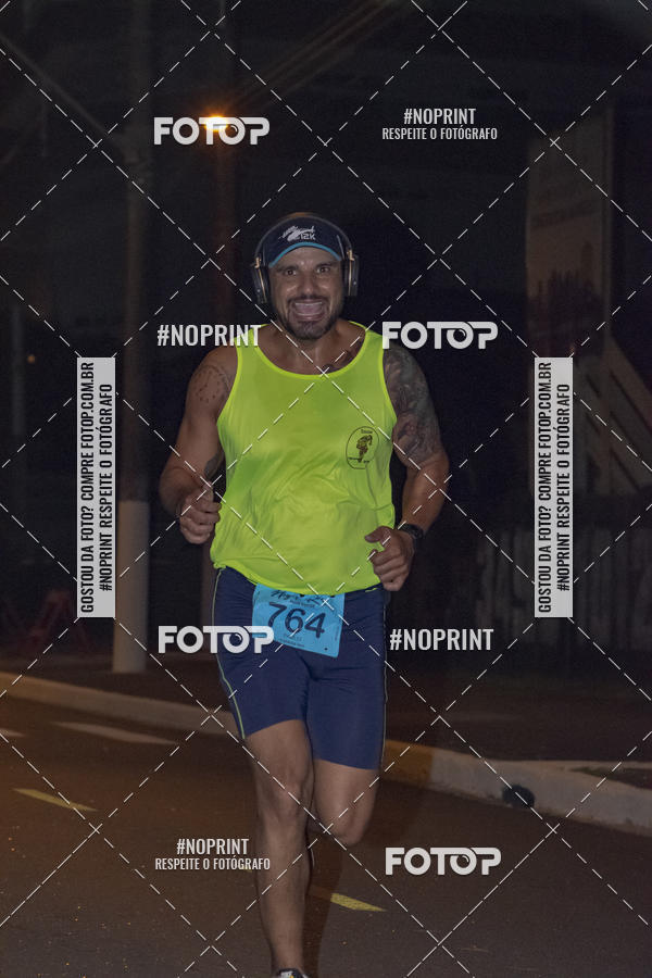 Buy your photos of the eventNight Run 5K 10K Praia Grande on Fotop