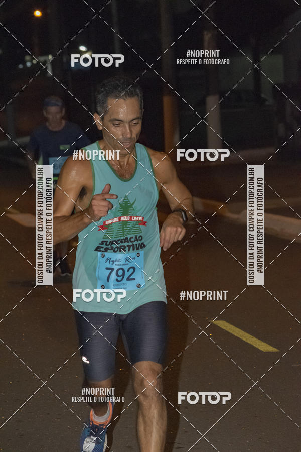 Buy your photos of the eventNight Run 5K 10K Praia Grande on Fotop