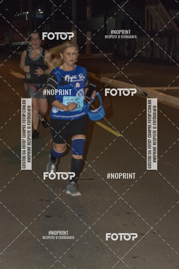 Buy your photos of the eventNight Run 5K 10K Praia Grande on Fotop