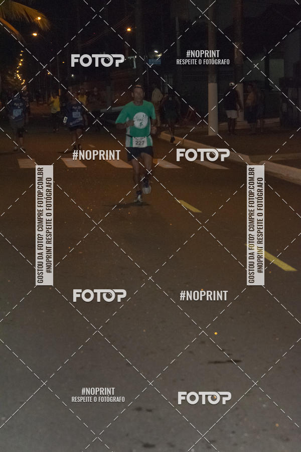 Buy your photos of the eventNight Run 5K 10K Praia Grande on Fotop