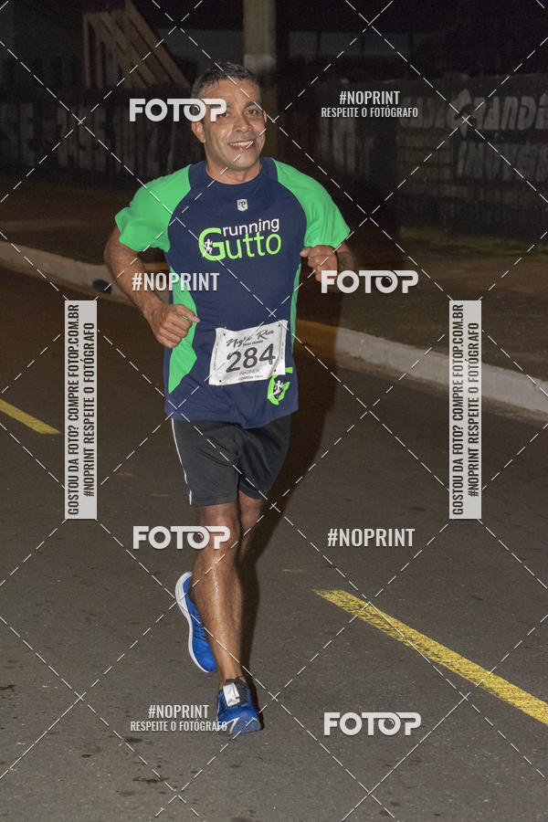 Buy your photos of the eventNight Run 5K 10K Praia Grande on Fotop