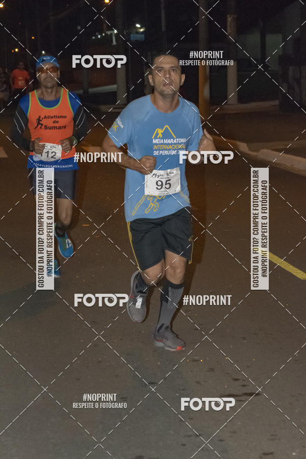 Buy your photos of the eventNight Run 5K 10K Praia Grande on Fotop