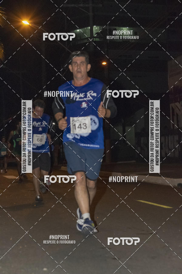 Buy your photos of the eventNight Run 5K 10K Praia Grande on Fotop