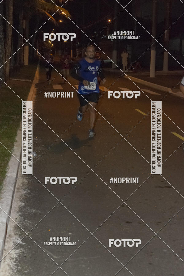 Buy your photos of the eventNight Run 5K 10K Praia Grande on Fotop