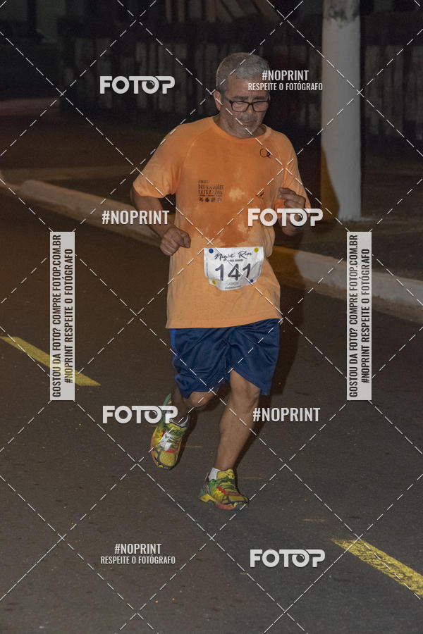 Buy your photos of the eventNight Run 5K 10K Praia Grande on Fotop