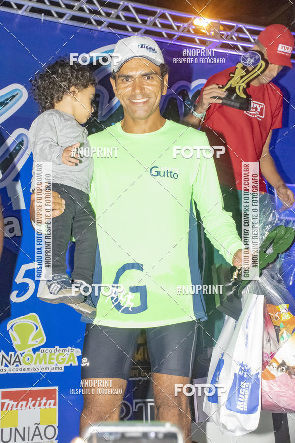 Buy your photos of the eventNight Run 5K 10K Praia Grande on Fotop