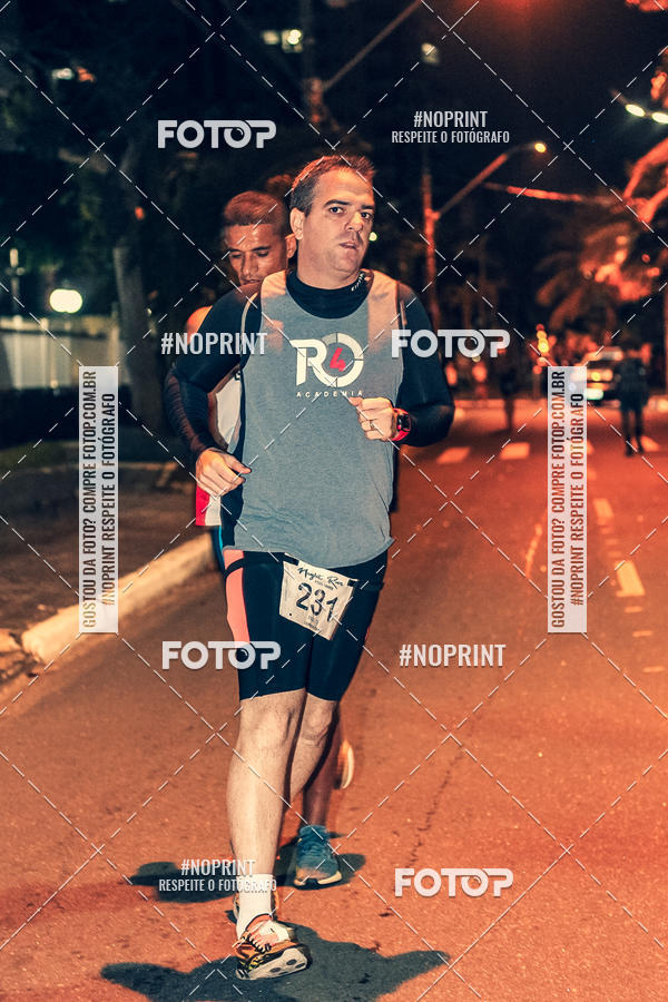 Buy your photos of the eventNight Run 5K 10K Praia Grande on Fotop