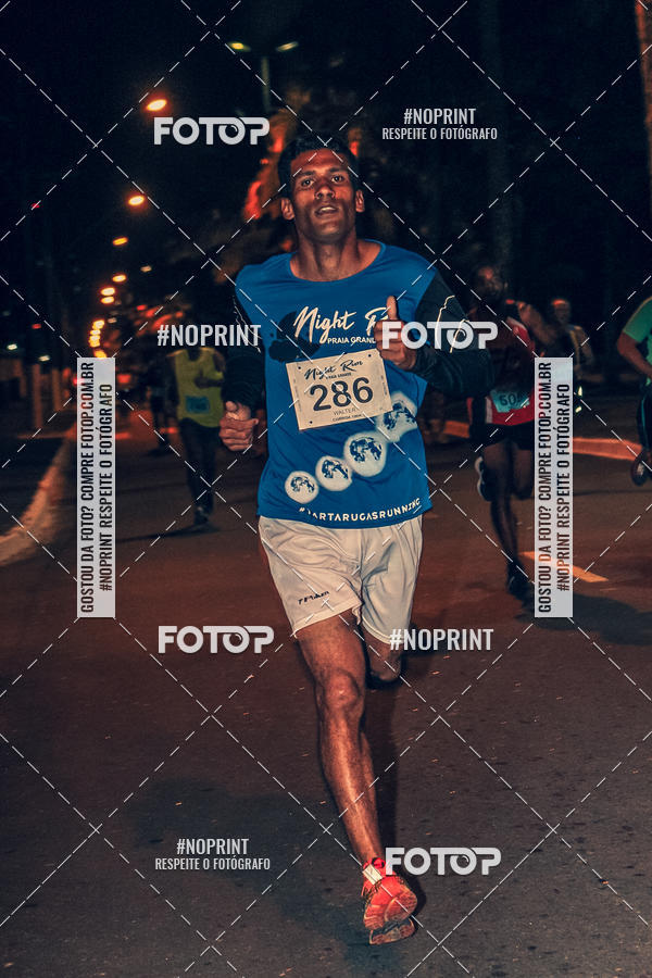 Buy your photos of the eventNight Run 5K 10K Praia Grande on Fotop