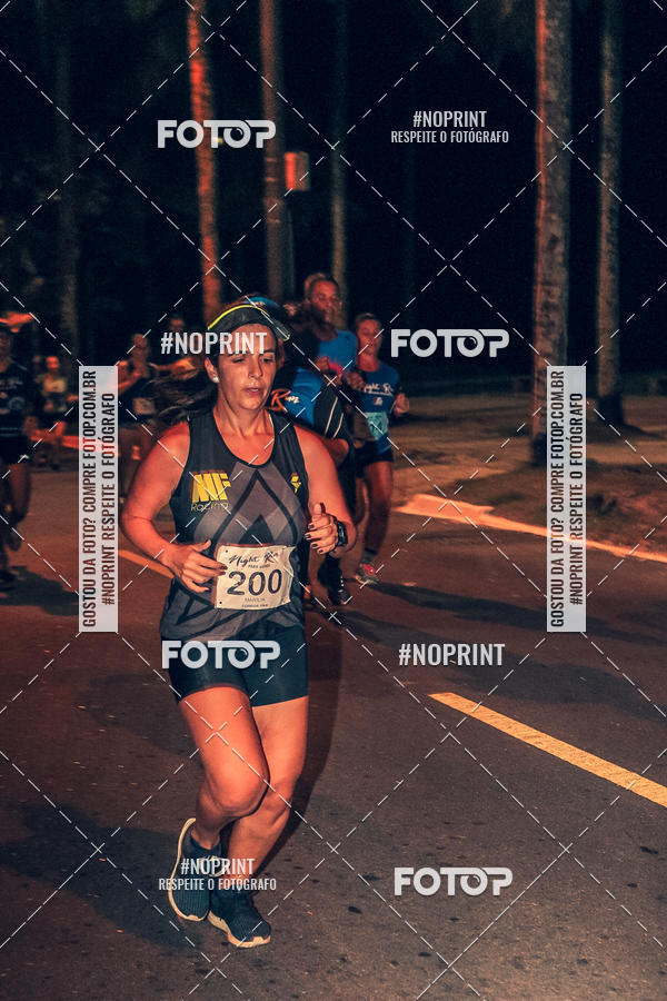 Buy your photos of the eventNight Run 5K 10K Praia Grande on Fotop