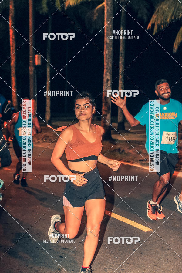 Buy your photos of the eventNight Run 5K 10K Praia Grande on Fotop