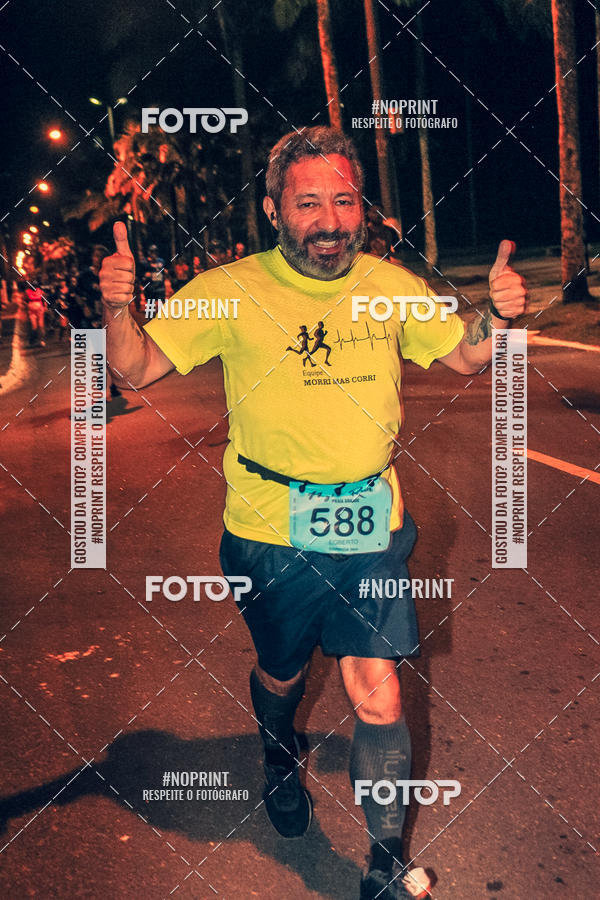 Buy your photos of the eventNight Run 5K 10K Praia Grande on Fotop
