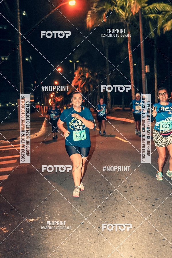 Buy your photos of the eventNight Run 5K 10K Praia Grande on Fotop