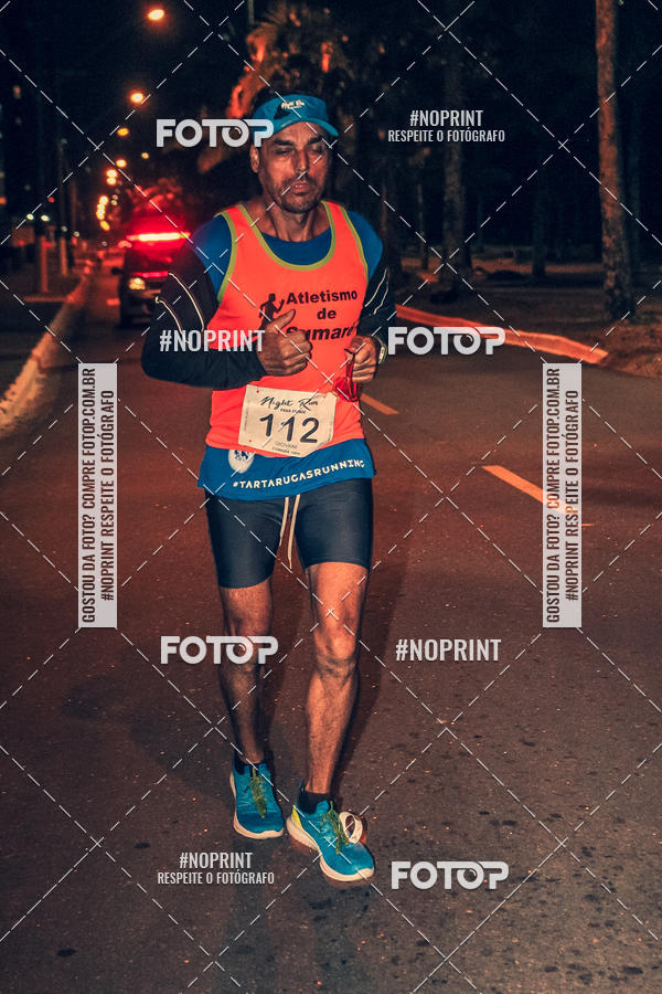 Buy your photos of the eventNight Run 5K 10K Praia Grande on Fotop