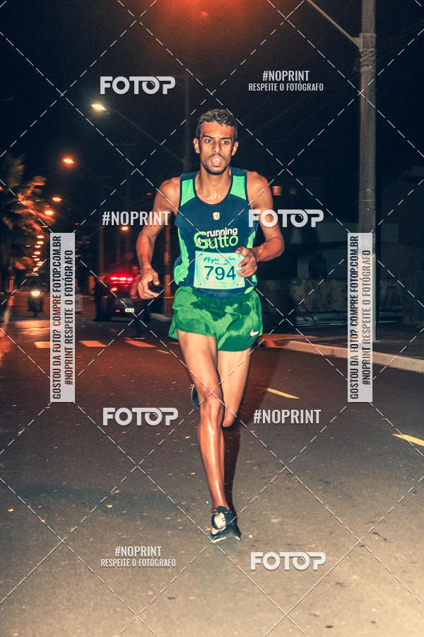 Buy your photos of the eventNight Run 5K 10K Praia Grande on Fotop
