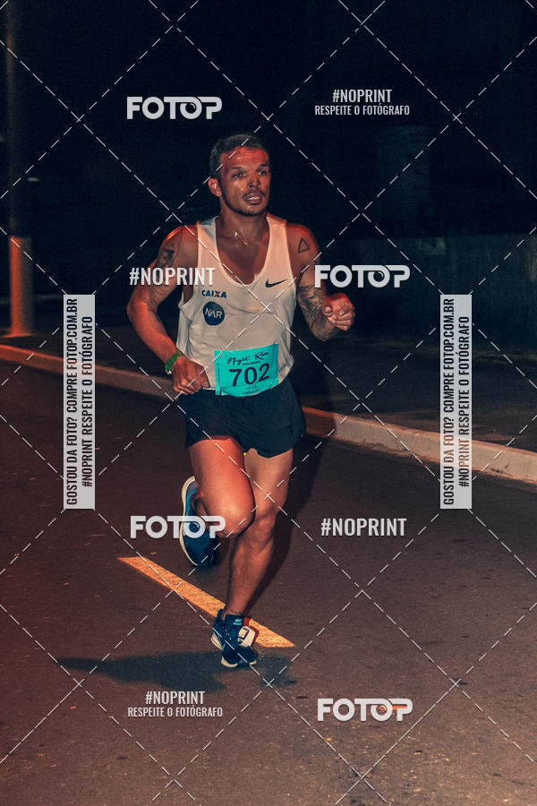 Buy your photos of the eventNight Run 5K 10K Praia Grande on Fotop