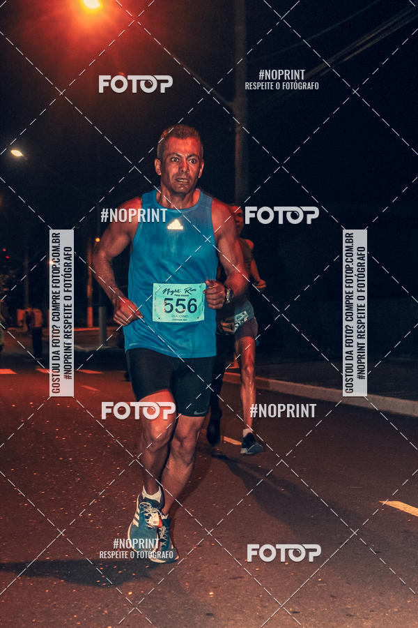 Buy your photos of the eventNight Run 5K 10K Praia Grande on Fotop