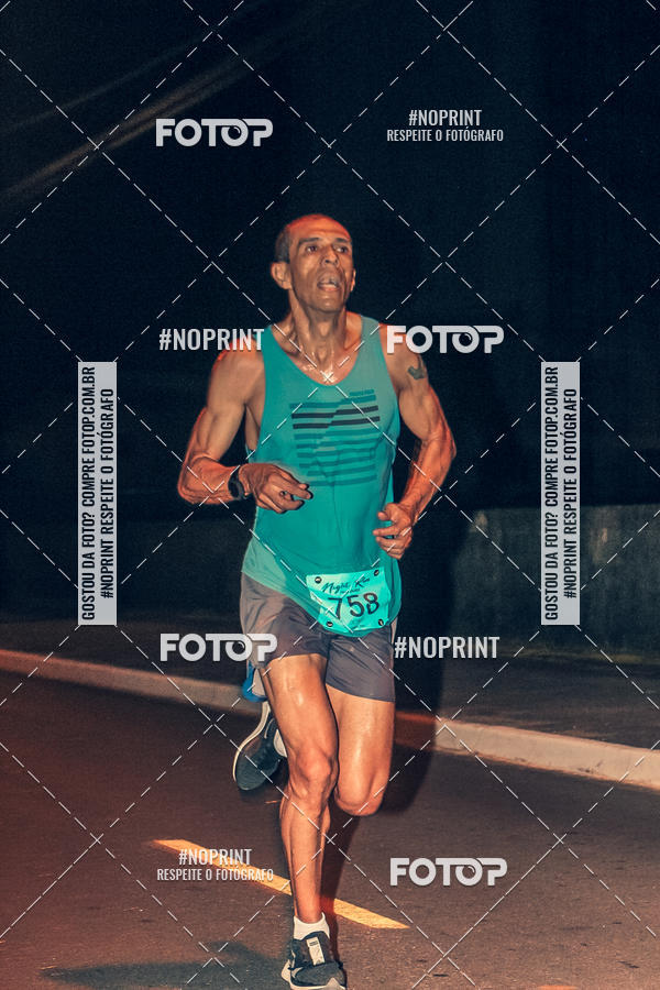 Buy your photos of the eventNight Run 5K 10K Praia Grande on Fotop