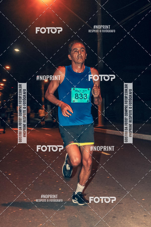 Buy your photos of the eventNight Run 5K 10K Praia Grande on Fotop