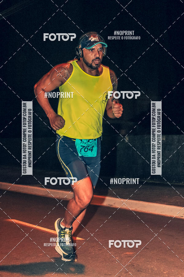 Buy your photos of the eventNight Run 5K 10K Praia Grande on Fotop