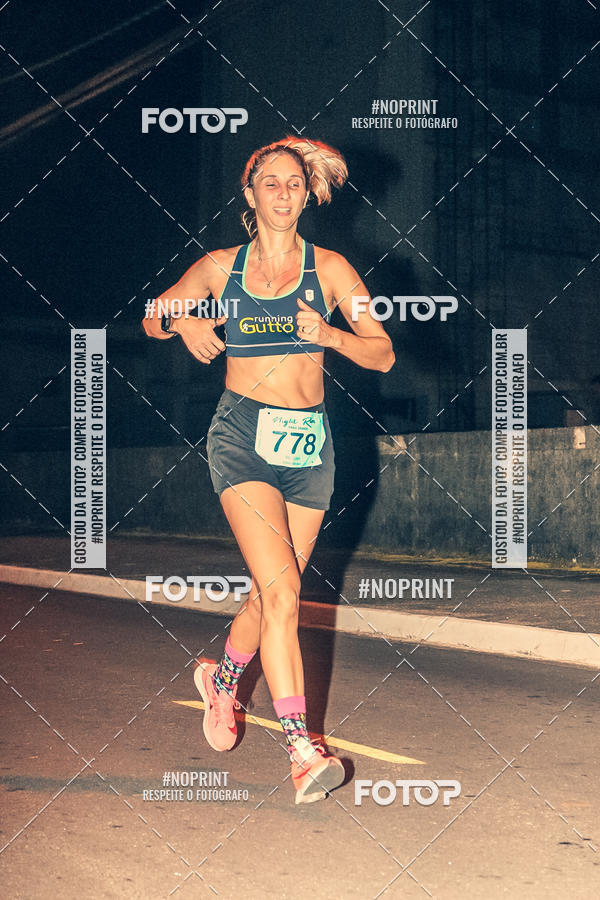 Buy your photos of the eventNight Run 5K 10K Praia Grande on Fotop