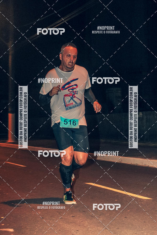 Buy your photos of the eventNight Run 5K 10K Praia Grande on Fotop