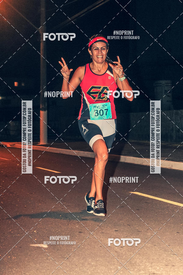 Buy your photos of the eventNight Run 5K 10K Praia Grande on Fotop