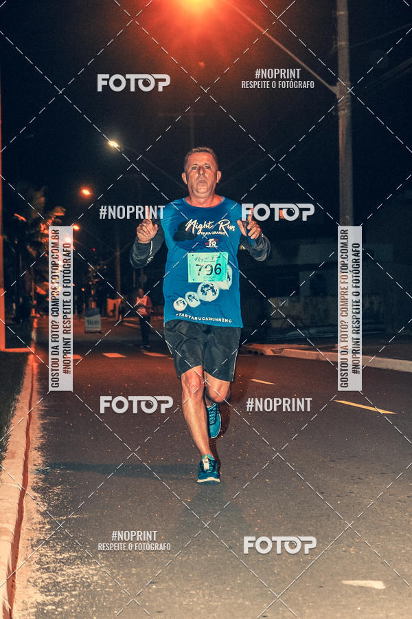Buy your photos of the eventNight Run 5K 10K Praia Grande on Fotop
