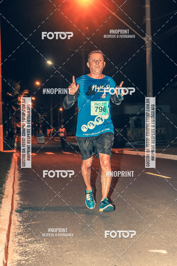Buy your photos of the eventNight Run 5K 10K Praia Grande on Fotop