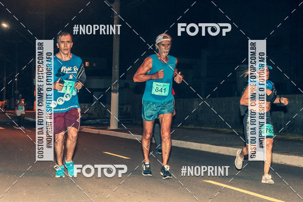 Buy your photos of the eventNight Run 5K 10K Praia Grande on Fotop