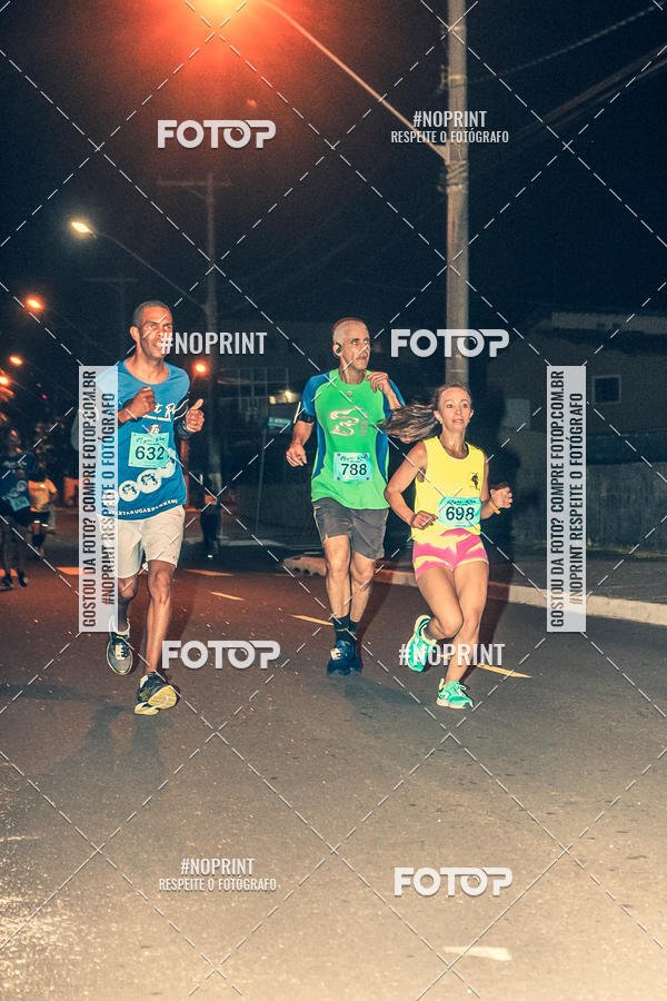 Buy your photos of the eventNight Run 5K 10K Praia Grande on Fotop