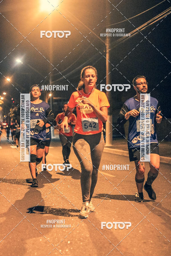 Buy your photos of the eventNight Run 5K 10K Praia Grande on Fotop