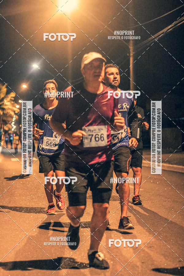 Buy your photos of the eventNight Run 5K 10K Praia Grande on Fotop