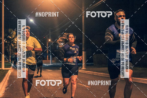 Buy your photos of the eventNight Run 5K 10K Praia Grande on Fotop